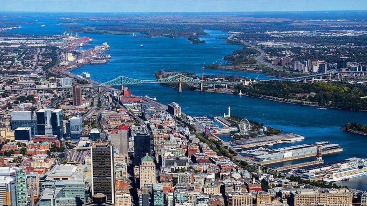 A bird's eye view of downtown Montreal and the Jacques Cartier Bridge.