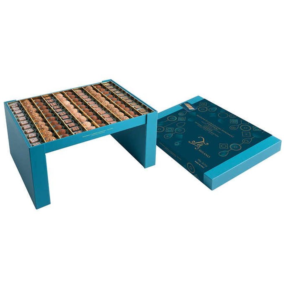 A blue chocolate box with feet that turn it into a table.