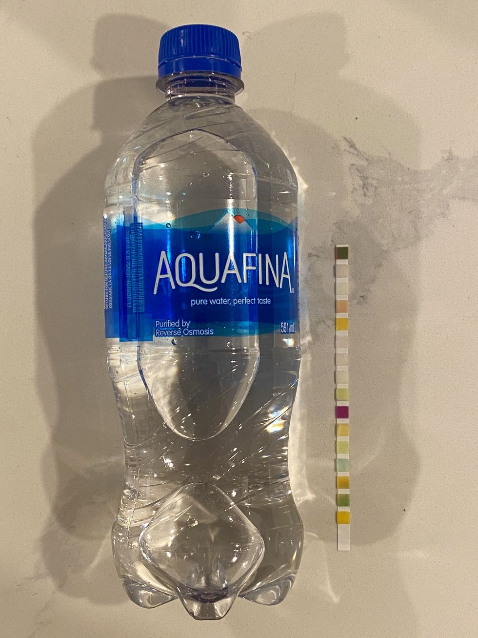 A bottle of Aquafina water.\u200b