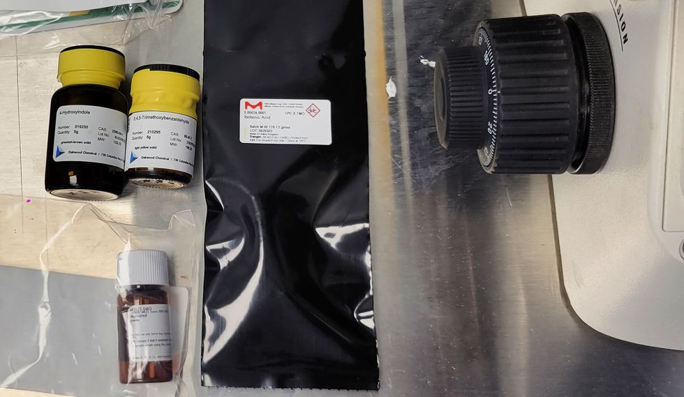 A bottle of muscimol, extracted from the fly agaric mushroom, along with other chemicals used to synthesize the compounds in natural psychedelics.