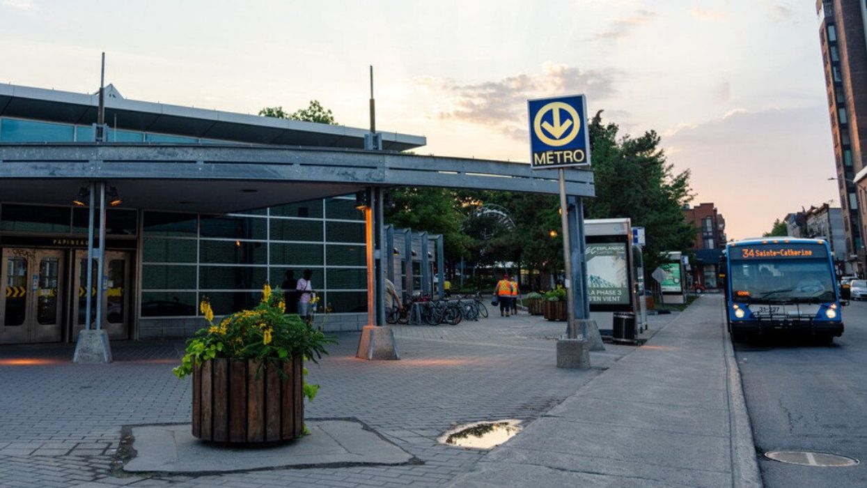 A bus parks outside of Papineau station in Montreal.