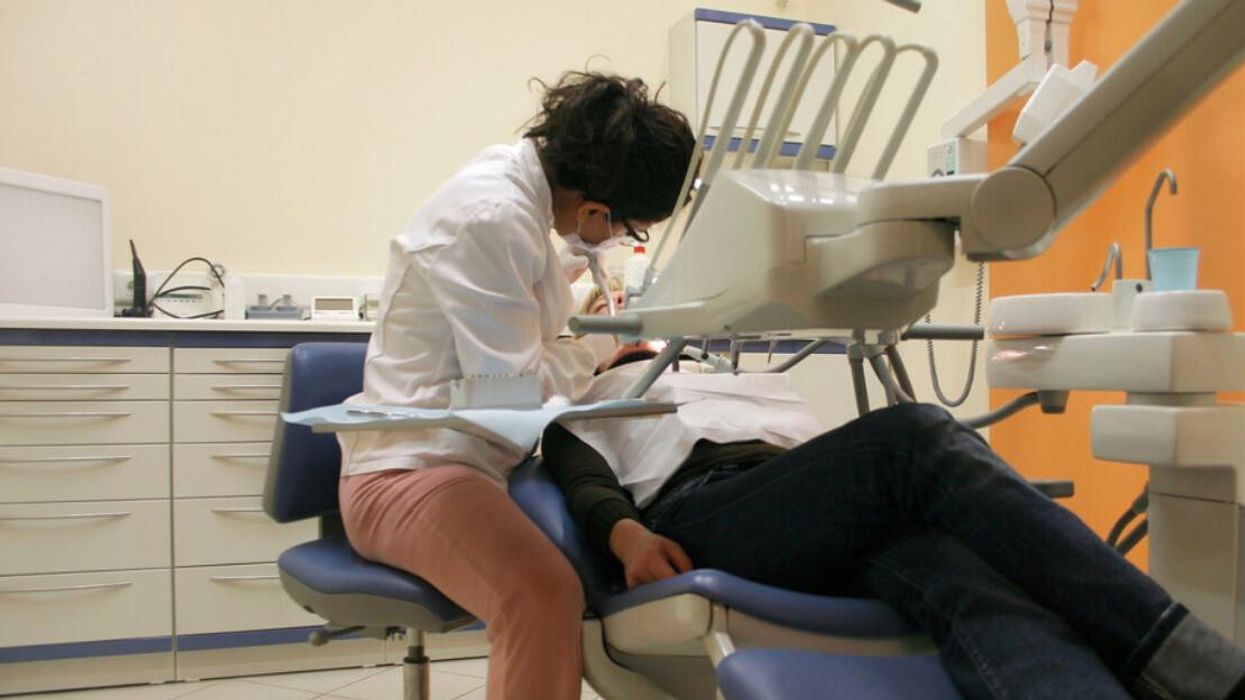 A dentist with a patient.