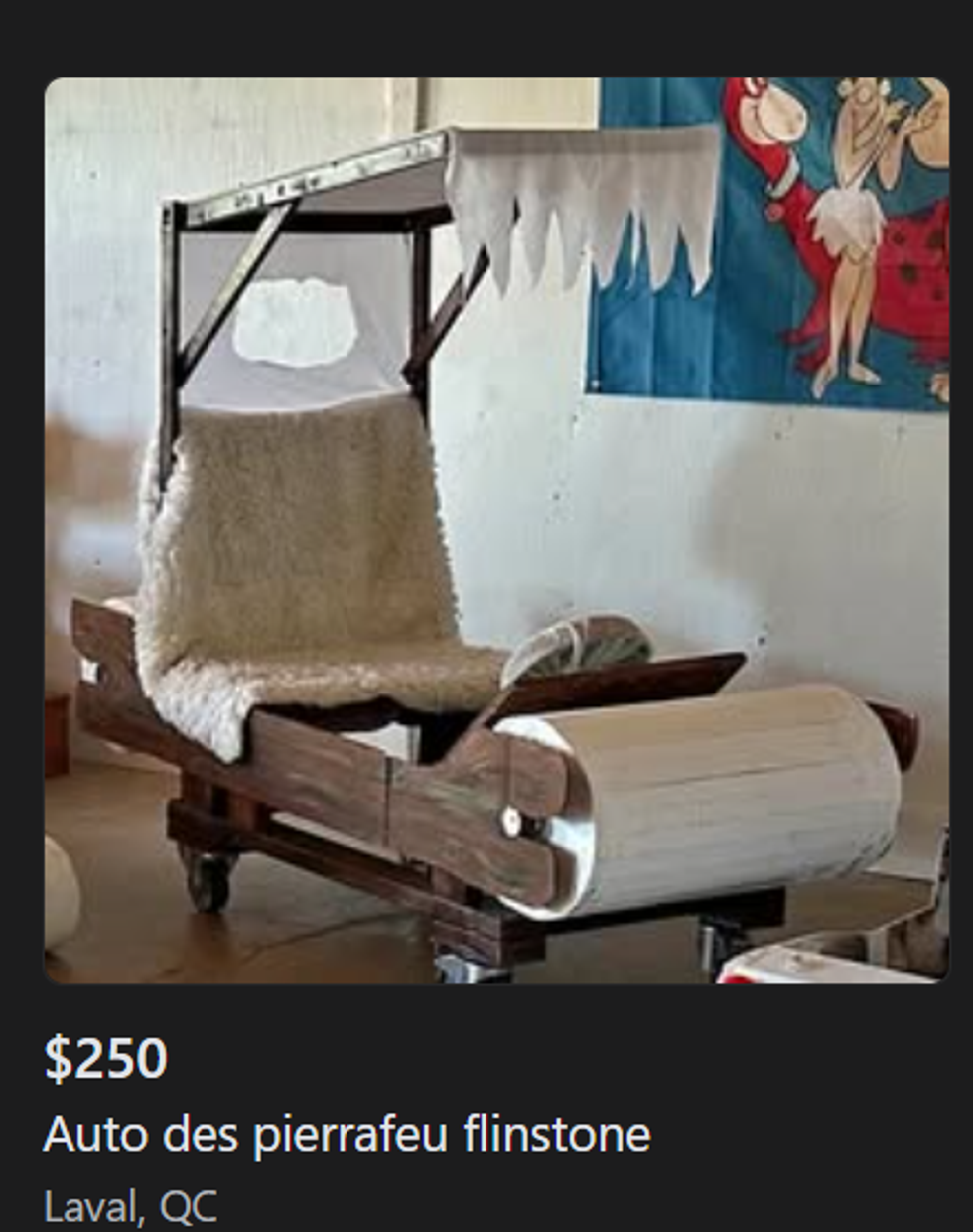 A Flintstones replica car for sale.
