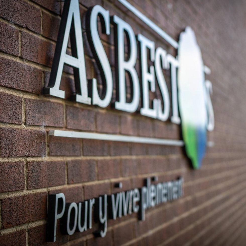 A former city sign for Asbestos, now called Val-des-Sources.