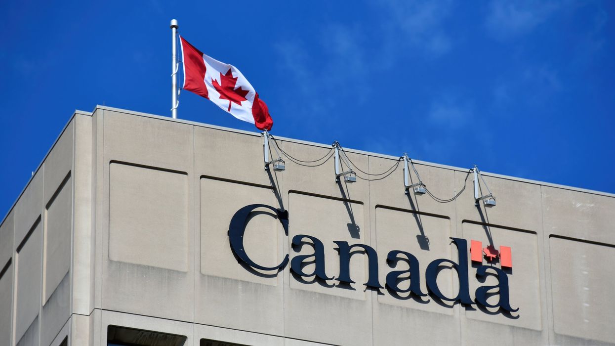 A Government of Canada building with a Canadian flag above it.