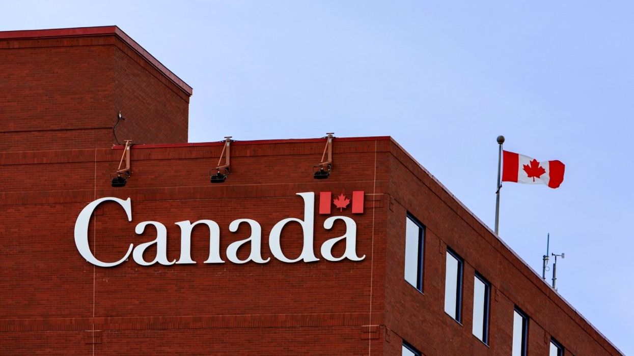 A Government of Canada building with a Canadian flag flying on the roof.