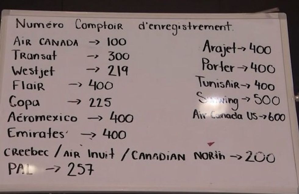 A handwritten registration guide at Montreal-Trudeau Airport.
