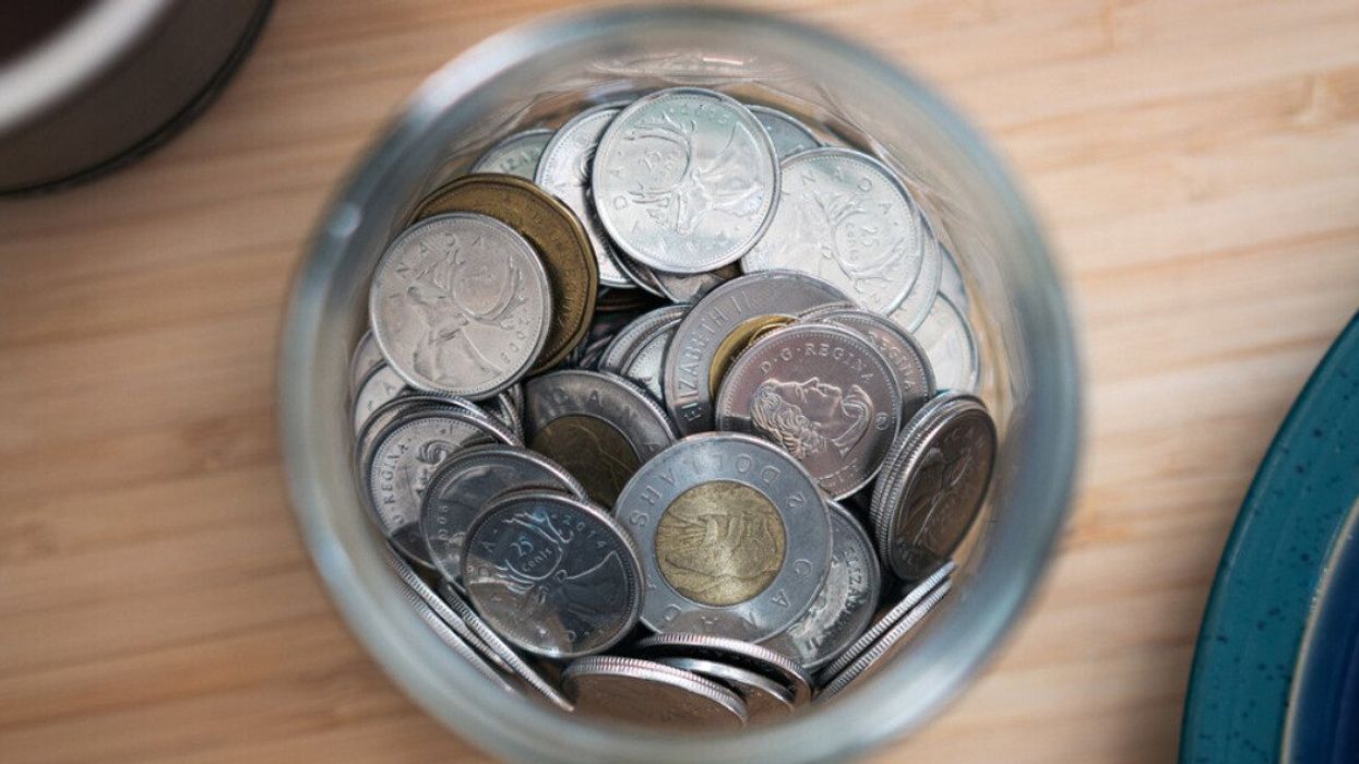 A jar of Canadian coins.