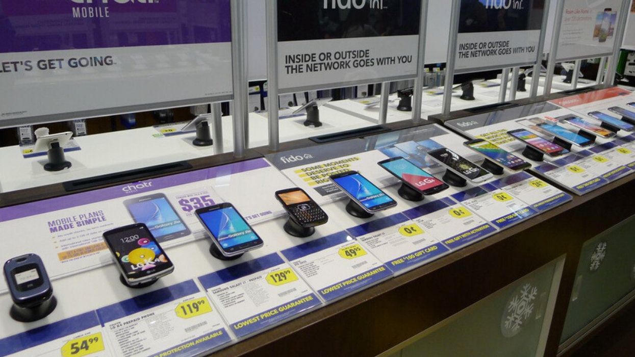 A lineup of phones at a store in Vancouver.