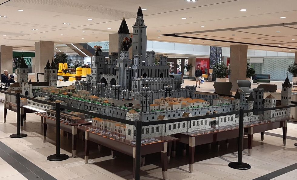 A massive grey castle combining features from The Lord of the Rings, Game of Thrones and Harry Potter.