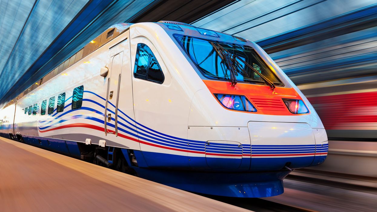 A modern high-speed train with a motion blur effect.