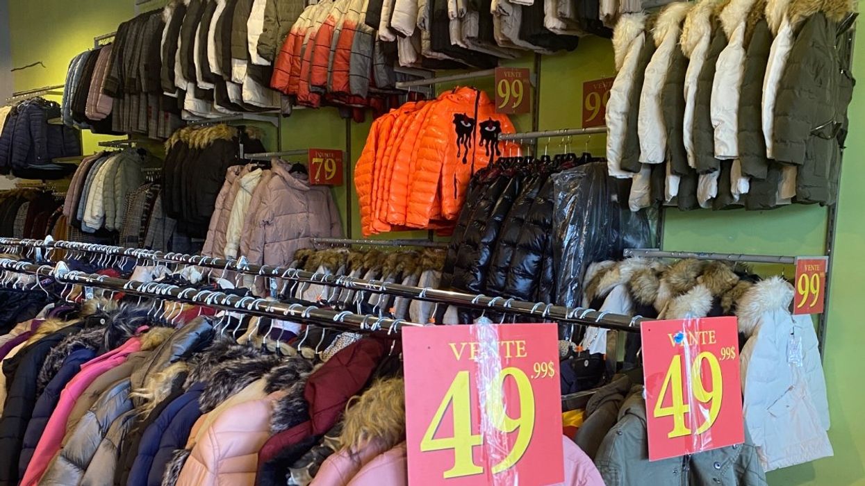 A number of winter jackets for sale at a Laval warehouse.