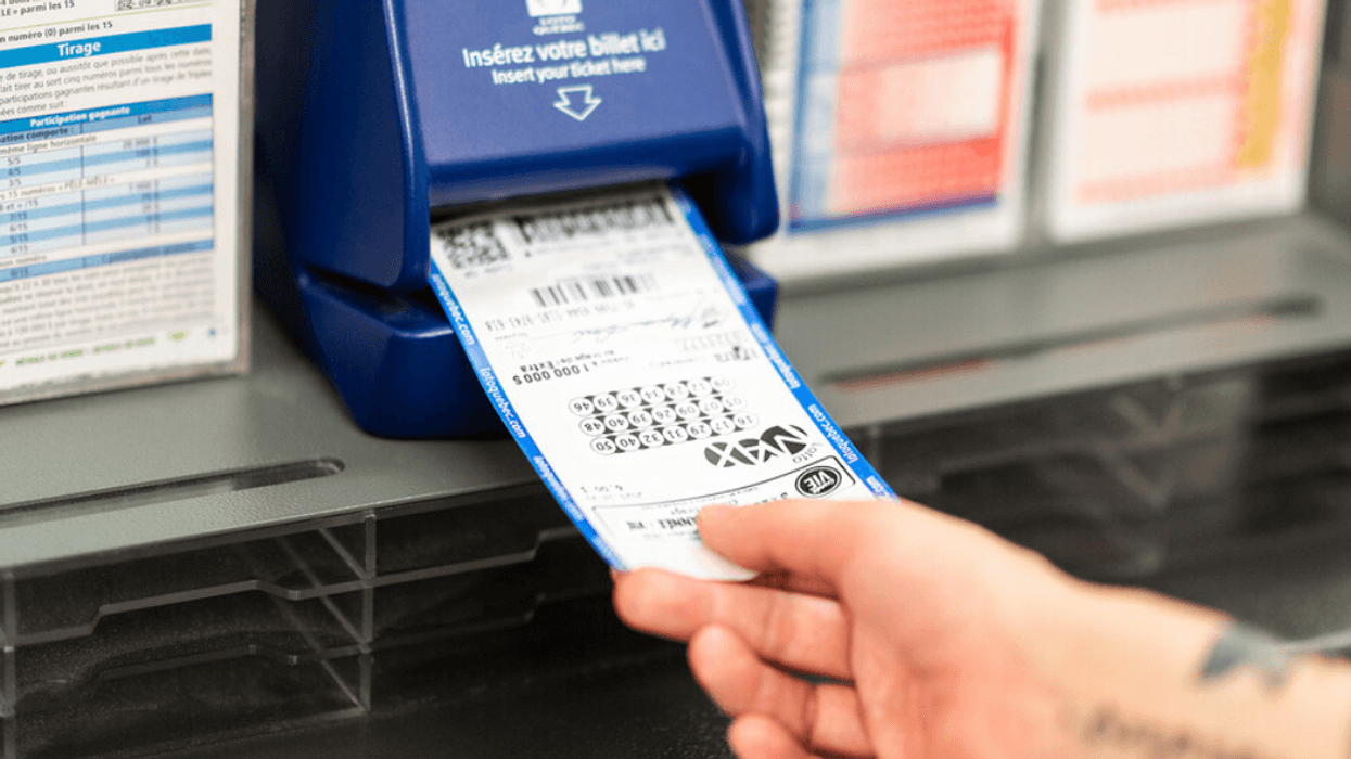 A person is validating a lottery ticket