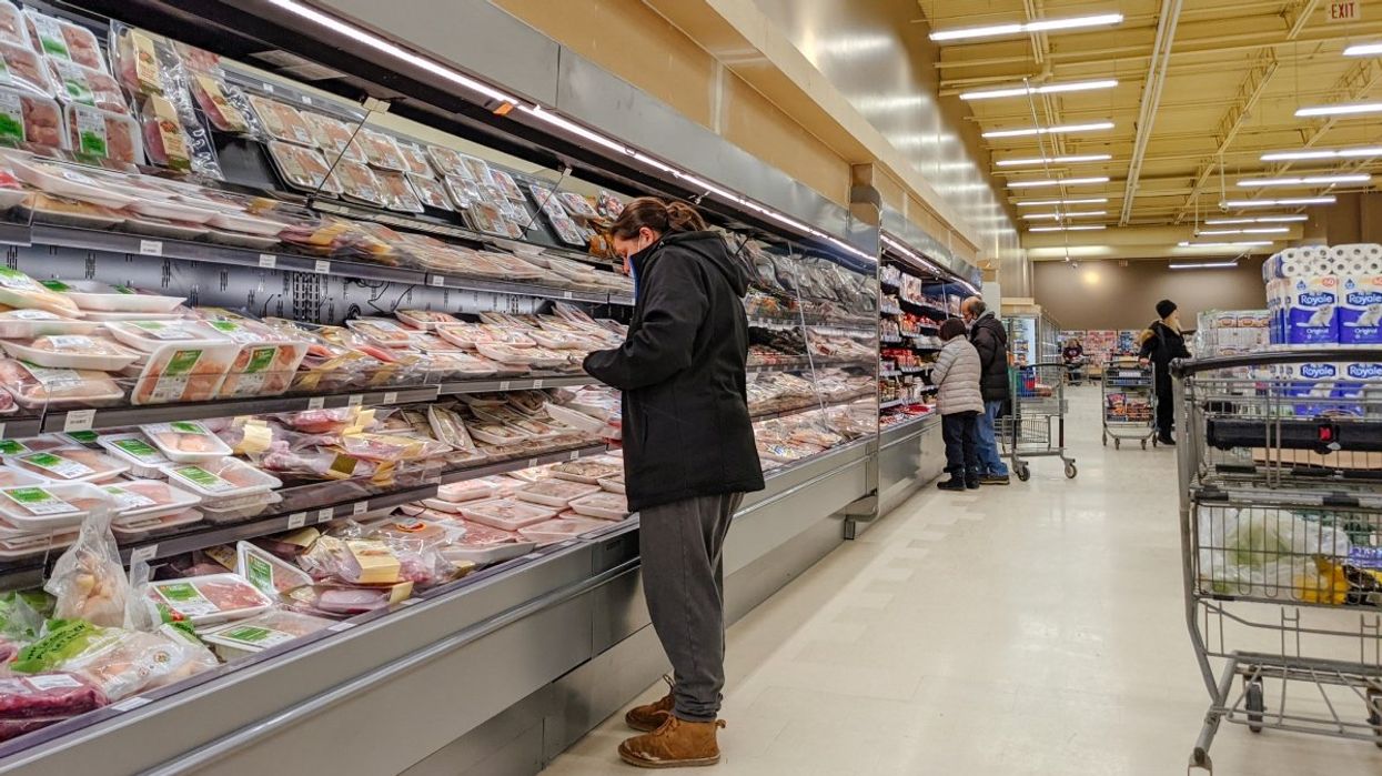A person shopping at a Canadian grocery store.