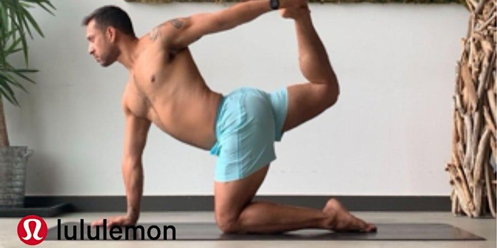 A person wearing Lululemon shorts doing a yoga pose.