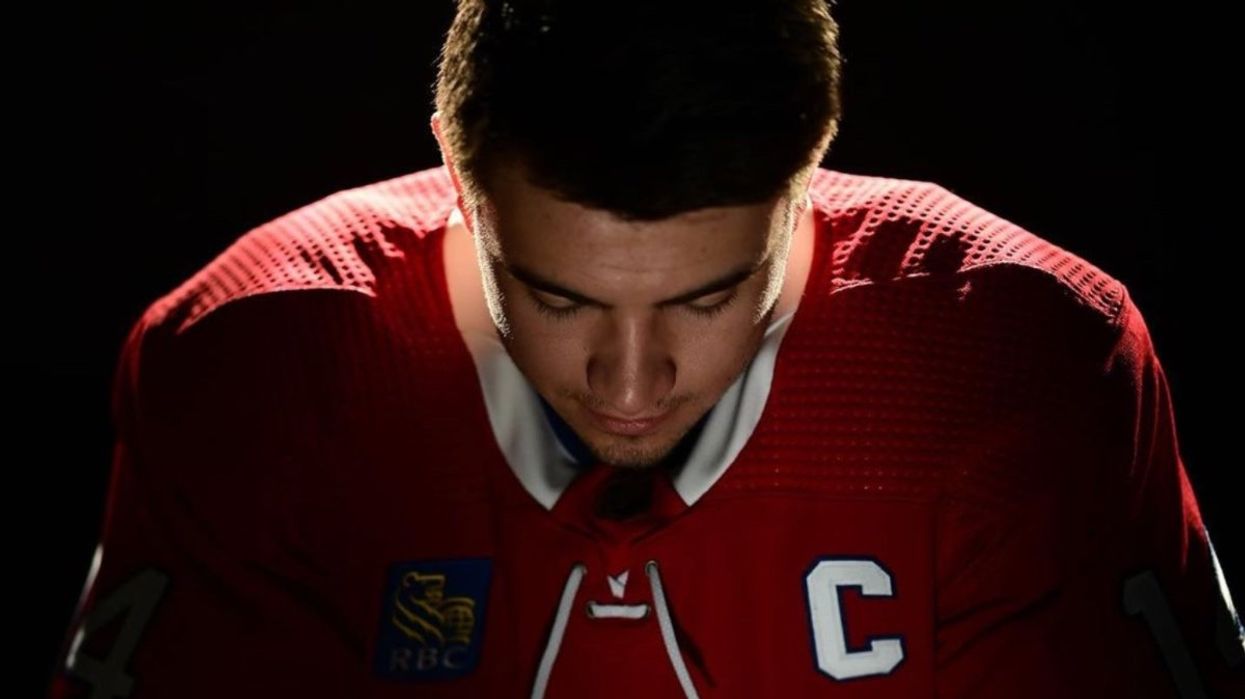 A photo of Nick Suzuki wearing a Montreal Canadiens hockey jersey.