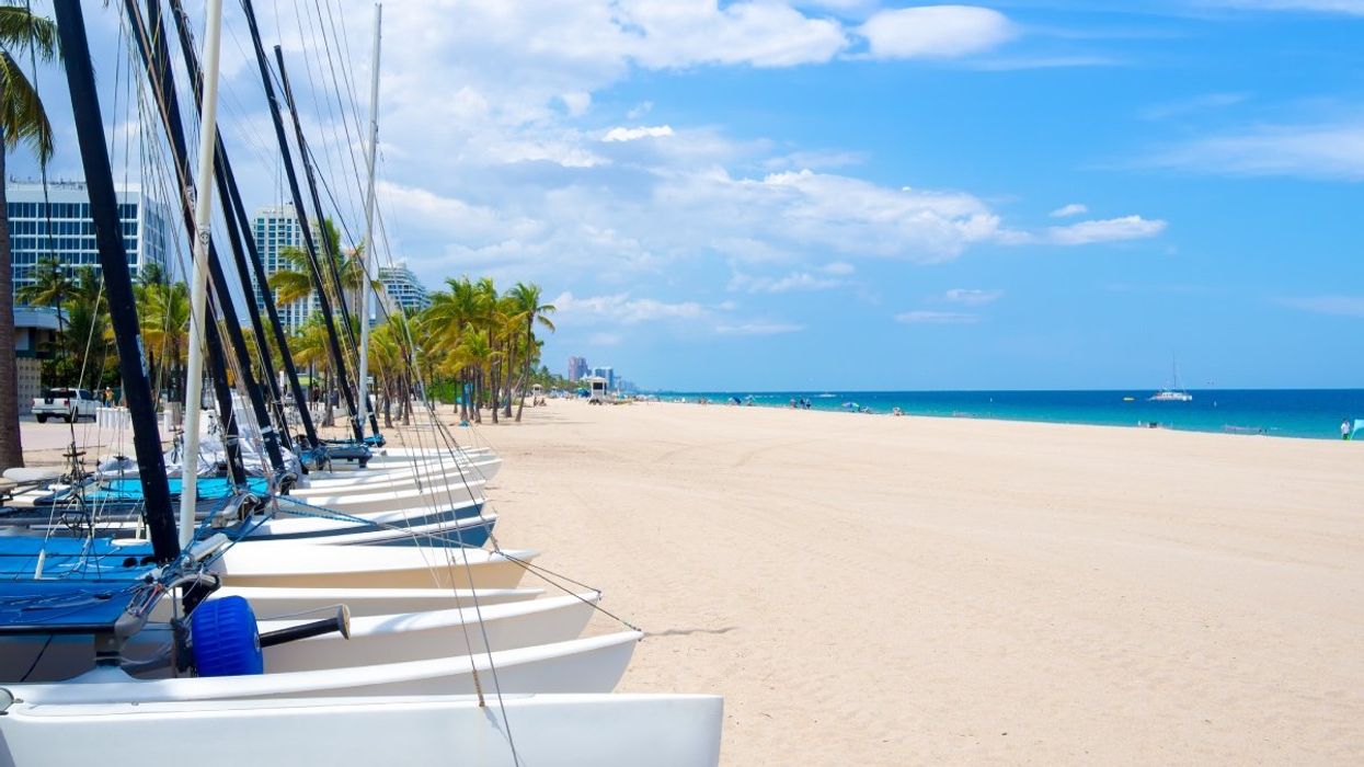 A photo of sailboats for rent on a beach in Fort Lauderdale, Florida.