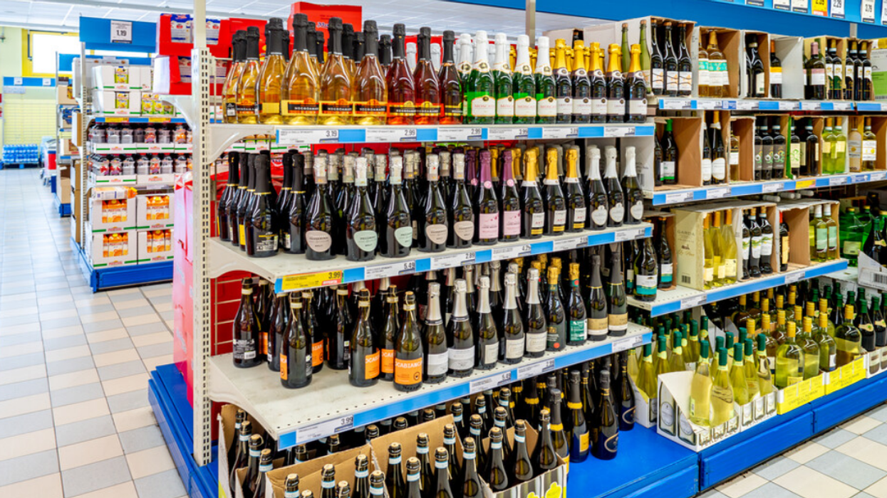 A range of sparkling wines sits on display in a store.