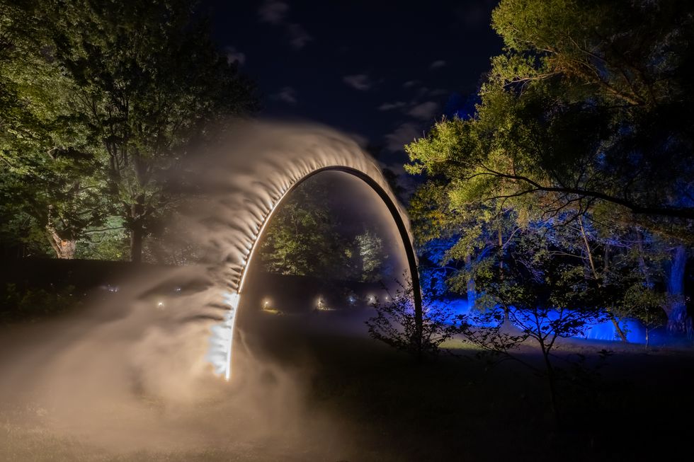 A ring emitting light and mist.