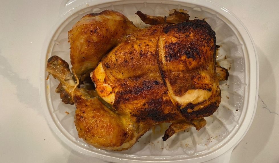 A rotisserie chicken from Maxi grocery store.