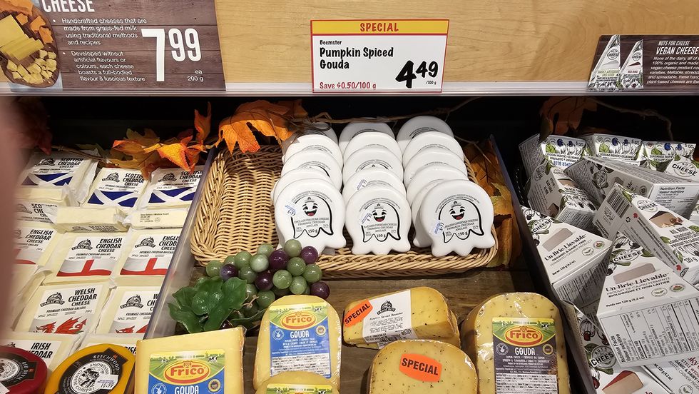 A selection of cheese at Farm Boy, including a seasonal pumpkin spiced gouda shaped like a ghost.