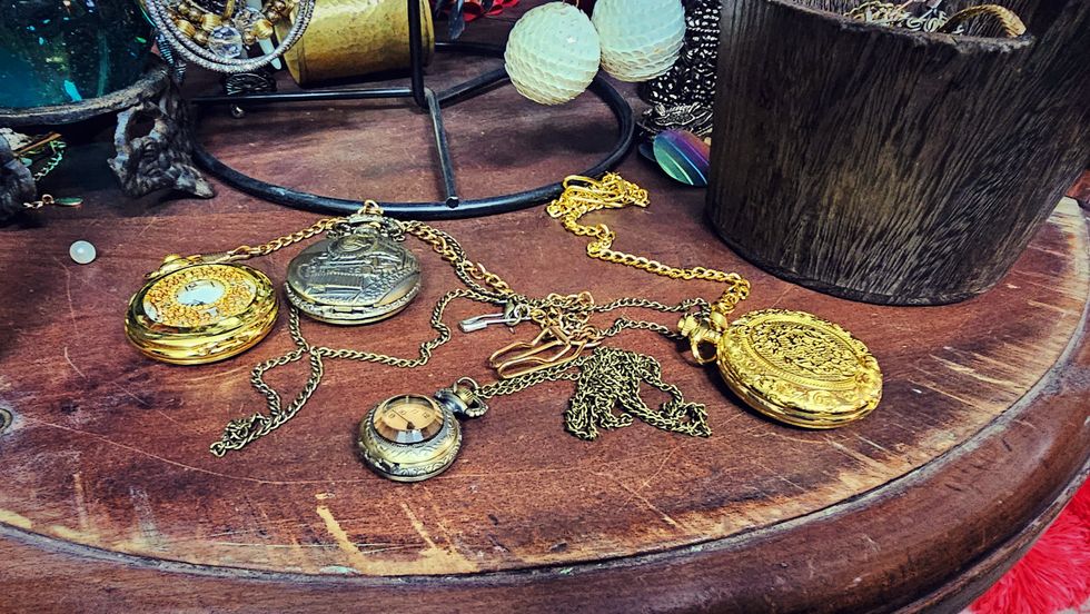 A selection of pocket watches to go with Victorian outfits rented from Ponton.