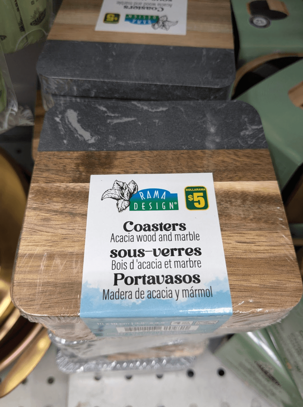 A set of four wood and marble coasters