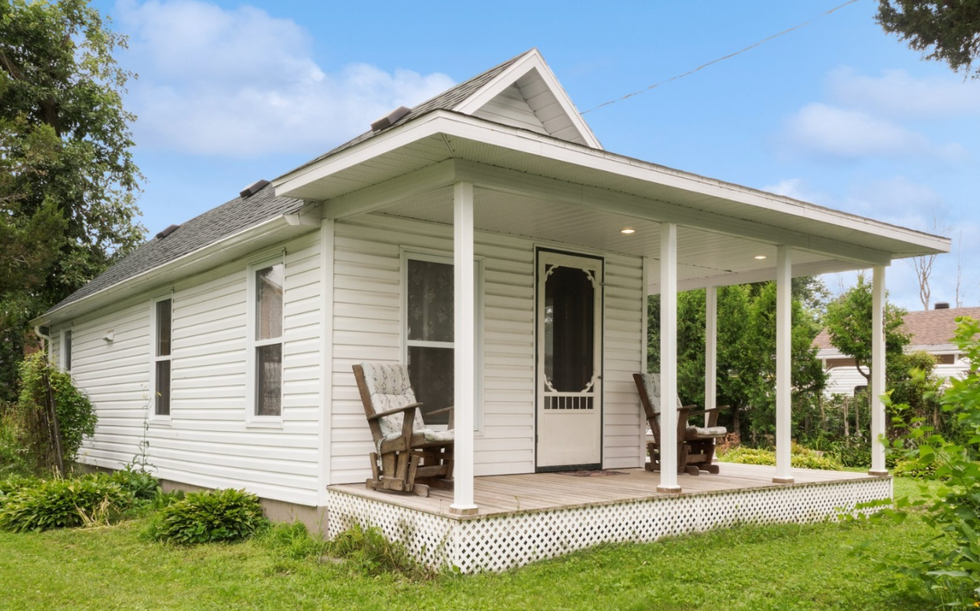 A small white house.