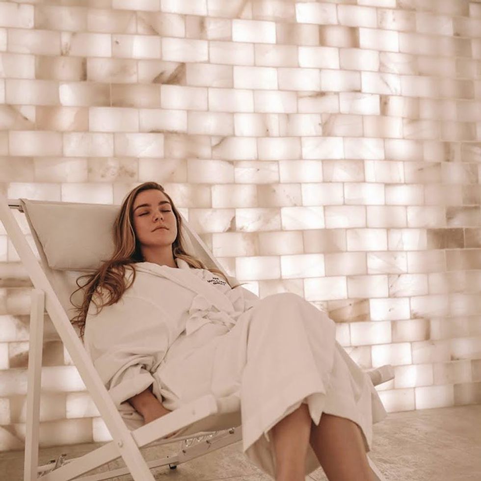 A spa guest relaxes in the Himalayan salt room at Spa William Gray. \u200b
