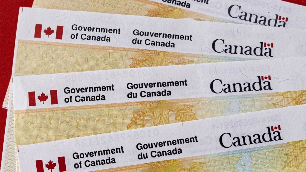 A stack of cheques from the Government of Canada.