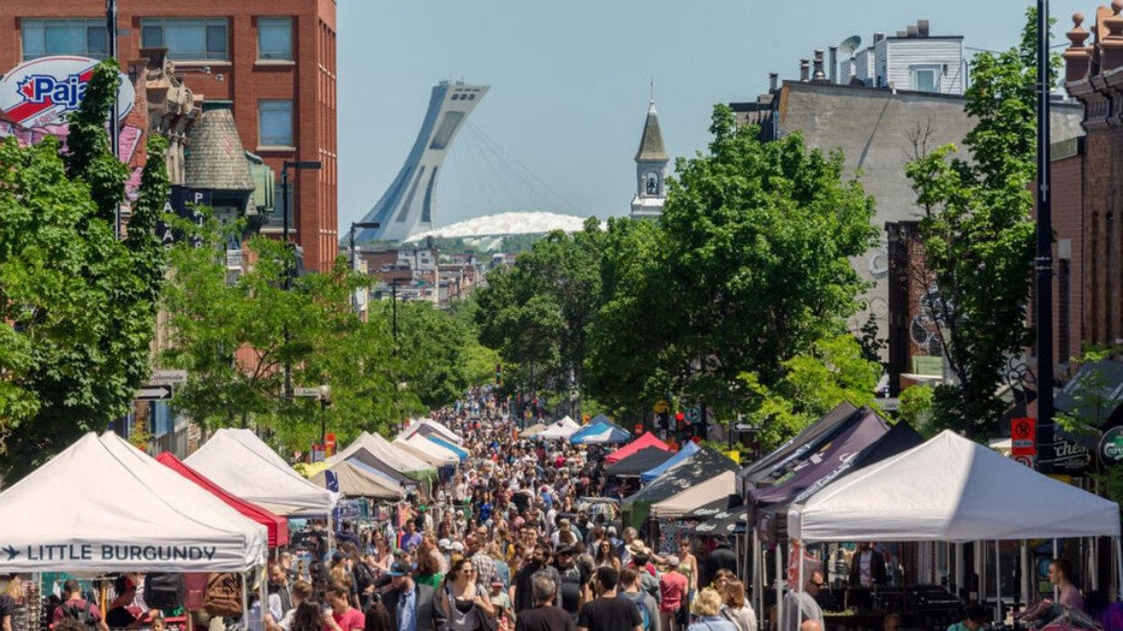 A summer sidewalk sale on Mont-Royal Avenue.