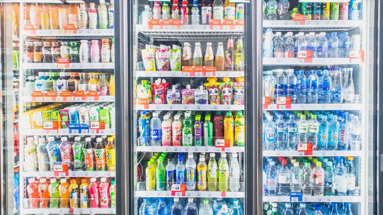 A variety of soft drinks, energy drinks, sports drinks and fruit juices at the grocery store.
