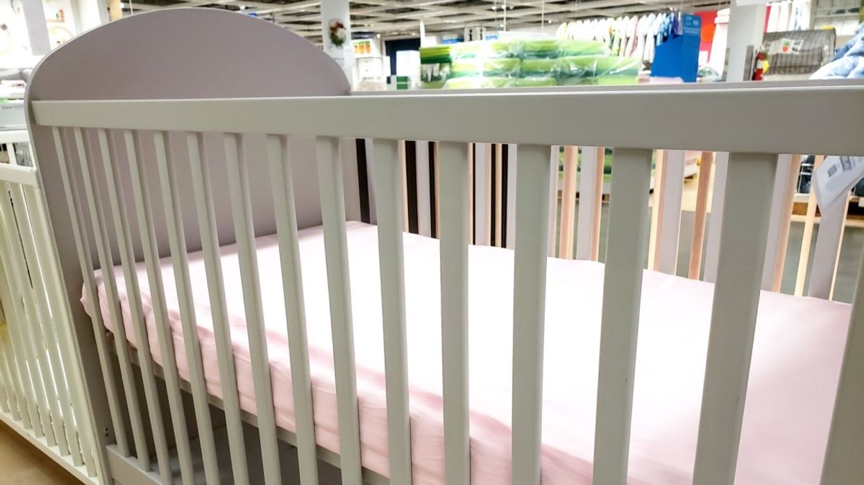 A view of a baby`s crib and mattress on display at a local department store in Canada.