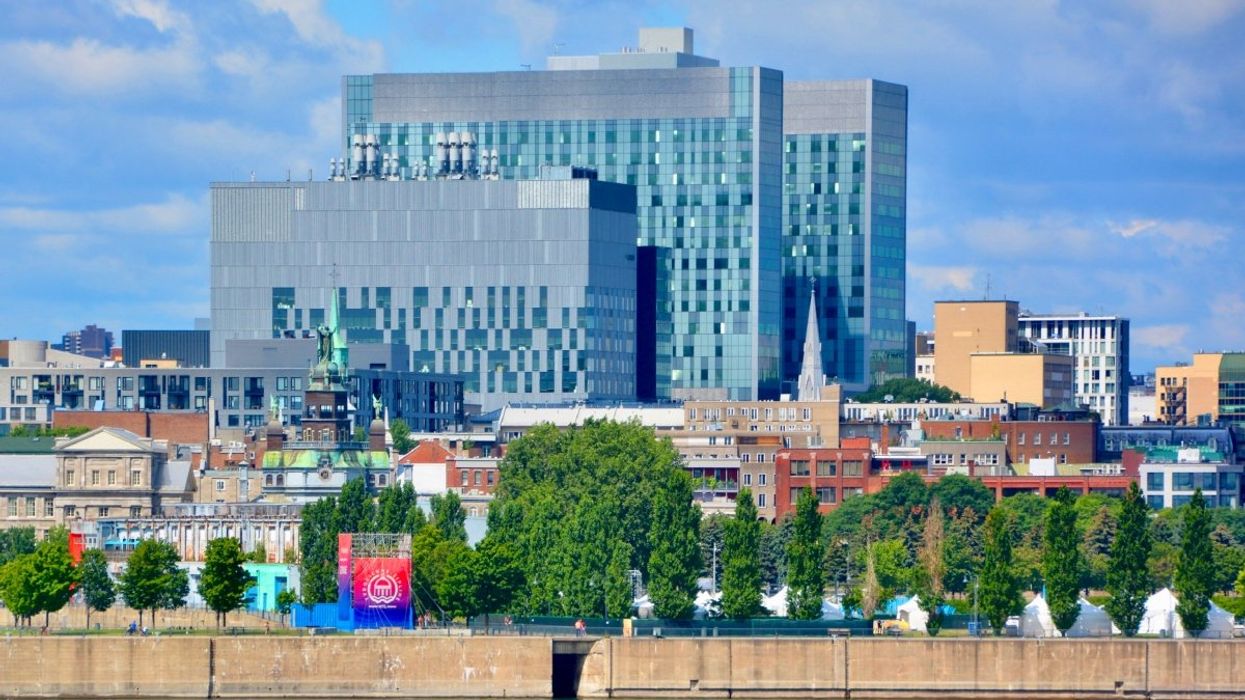 A view of the Centre hospitalier de l'Université de Montréal (CHUM) and parts of downtown Montreal and the Old Port during the summer.