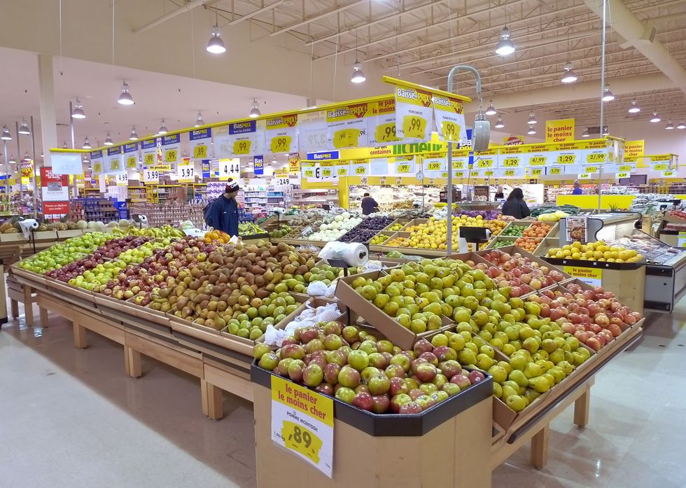 A view of the fresh fruit section of a grocery store in Quebec.