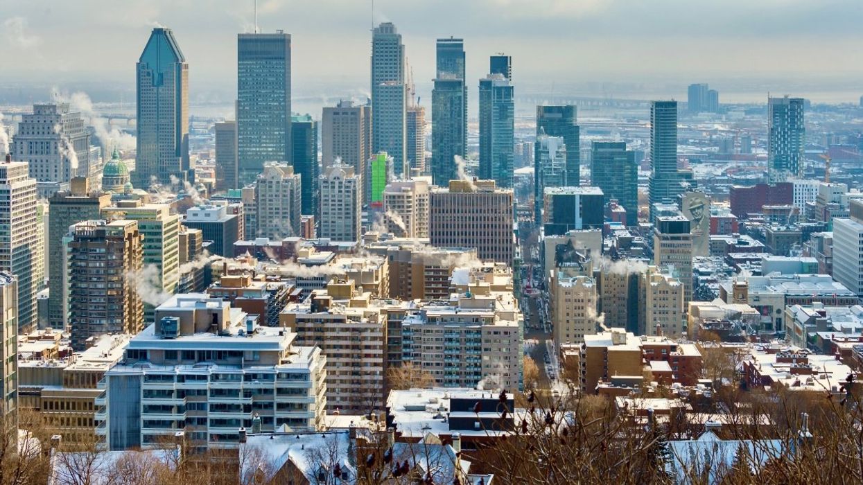 A view of the Montreal skyline from the Mont-Royal lookout during the winter time.