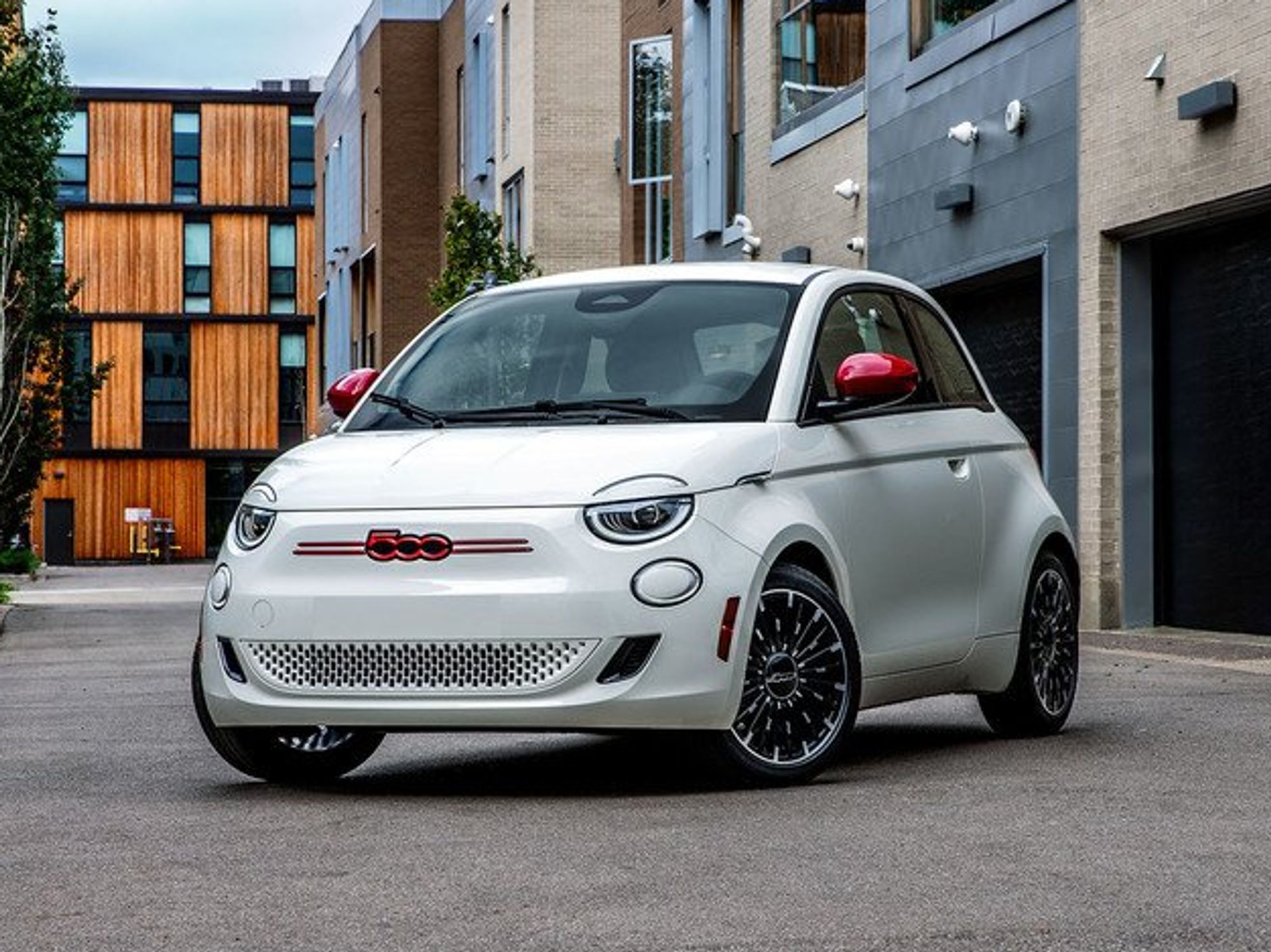A white and red Fiat 500e.