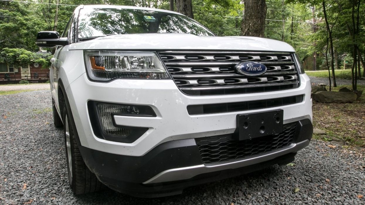 A white Ford Explorer.