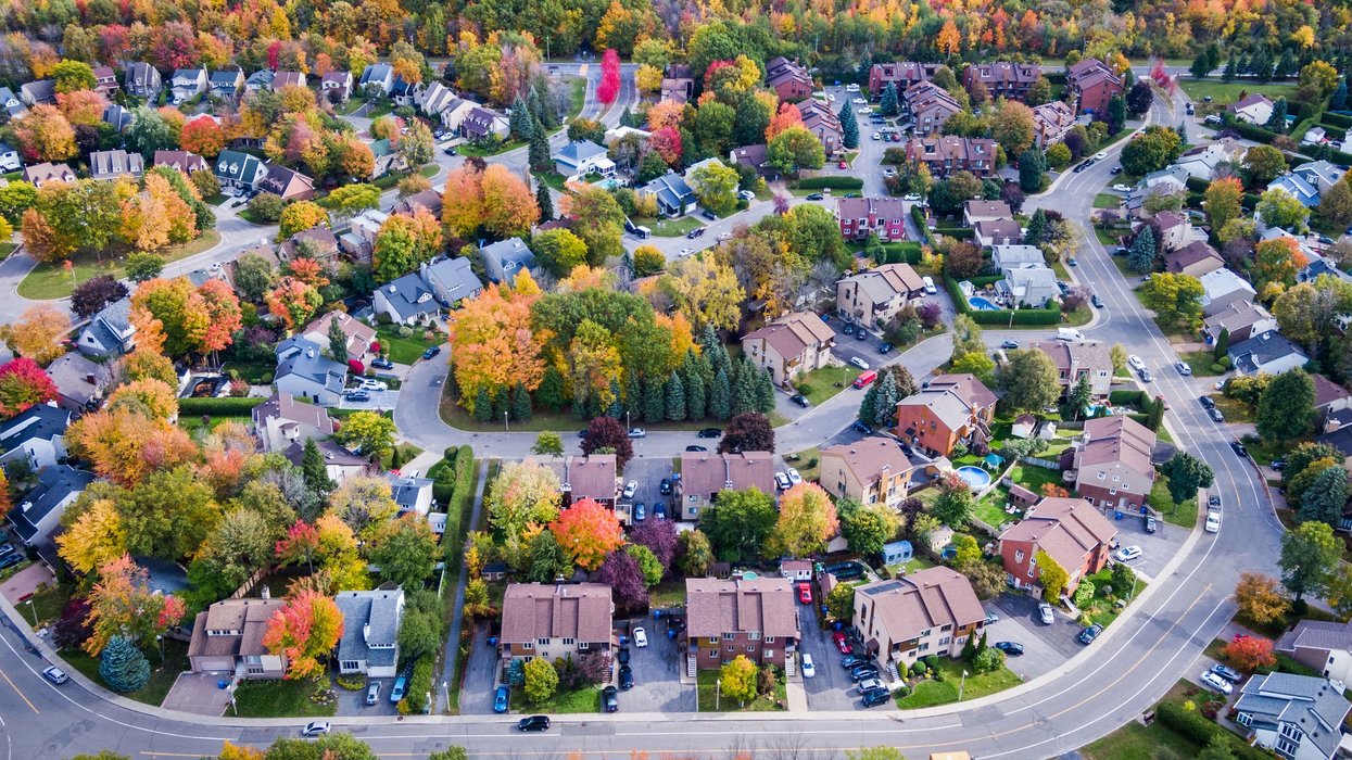 Aerial View of Residential Neighbourhood in Montreal During Autumn Season, Quebec, Canada. Aerial view of houses in residential neighbourhood in the suburbs of Montreal during autumn season in Quebec, Canada.