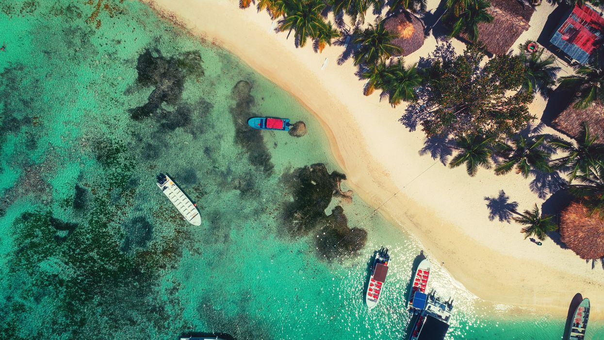 Aerial view of tropical island beach in Punta Cana resort, Dominican Republic.