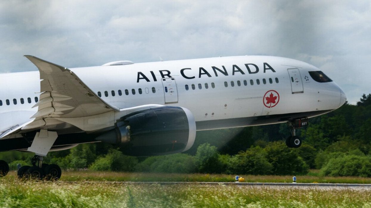 Air Canada plane takes off.