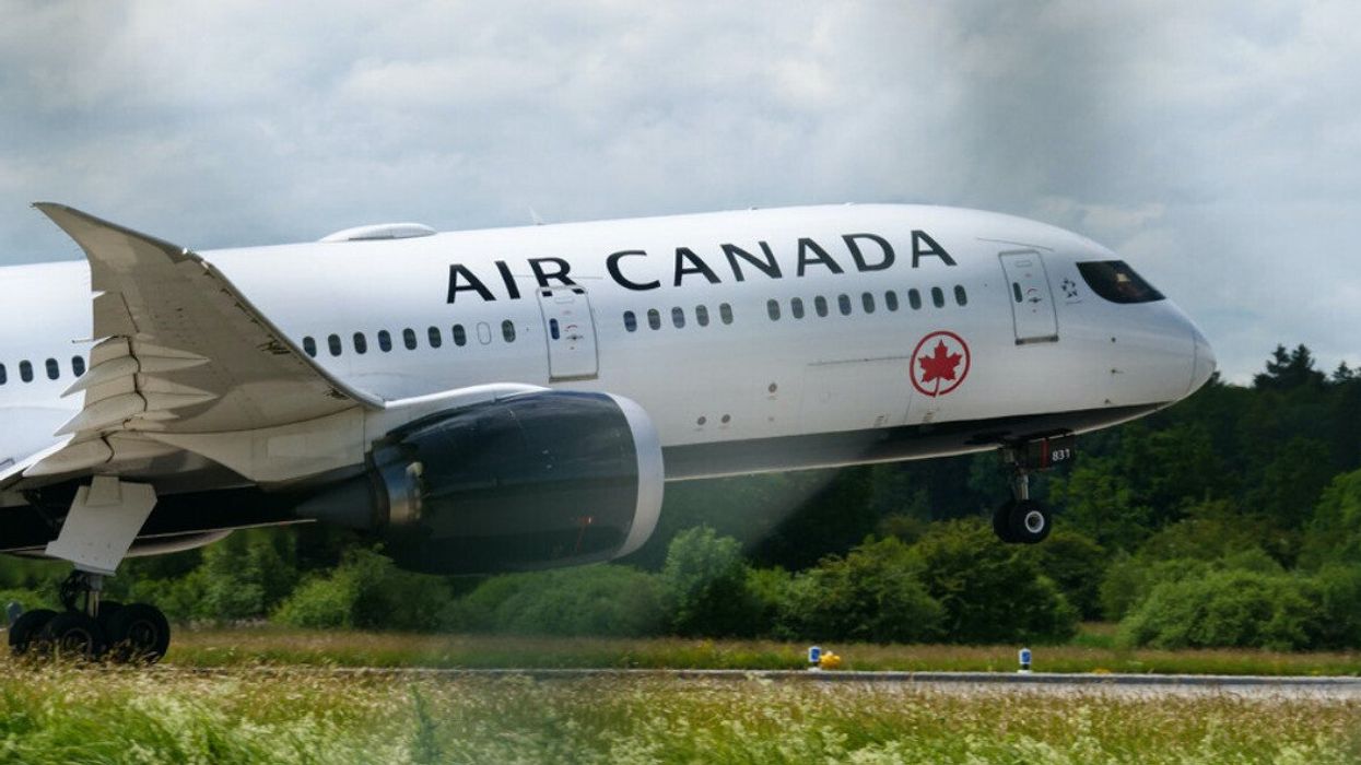 Air Canada plane takes off.
