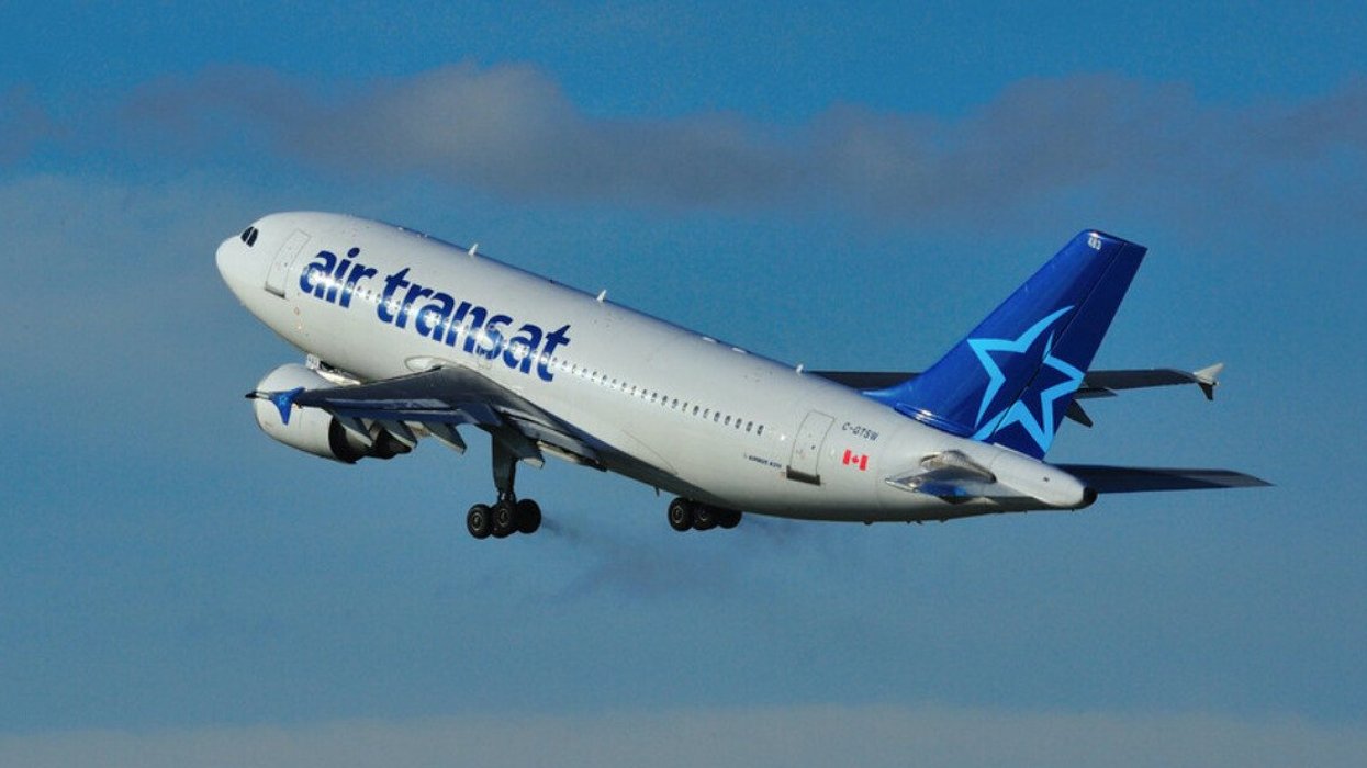 An Air Transat plane in flight.