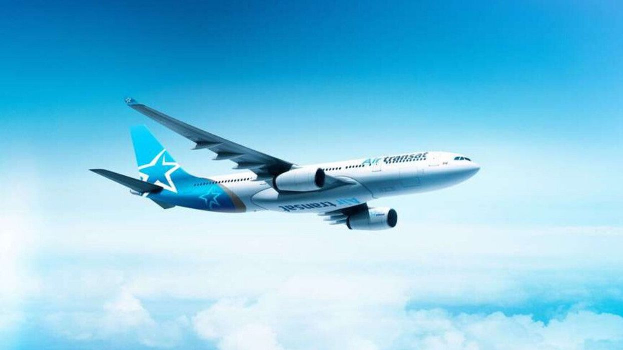 An Air Transat plane in flight.
