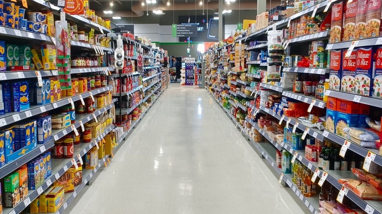 An empty grocery store aisle at a Canadian supermarket.