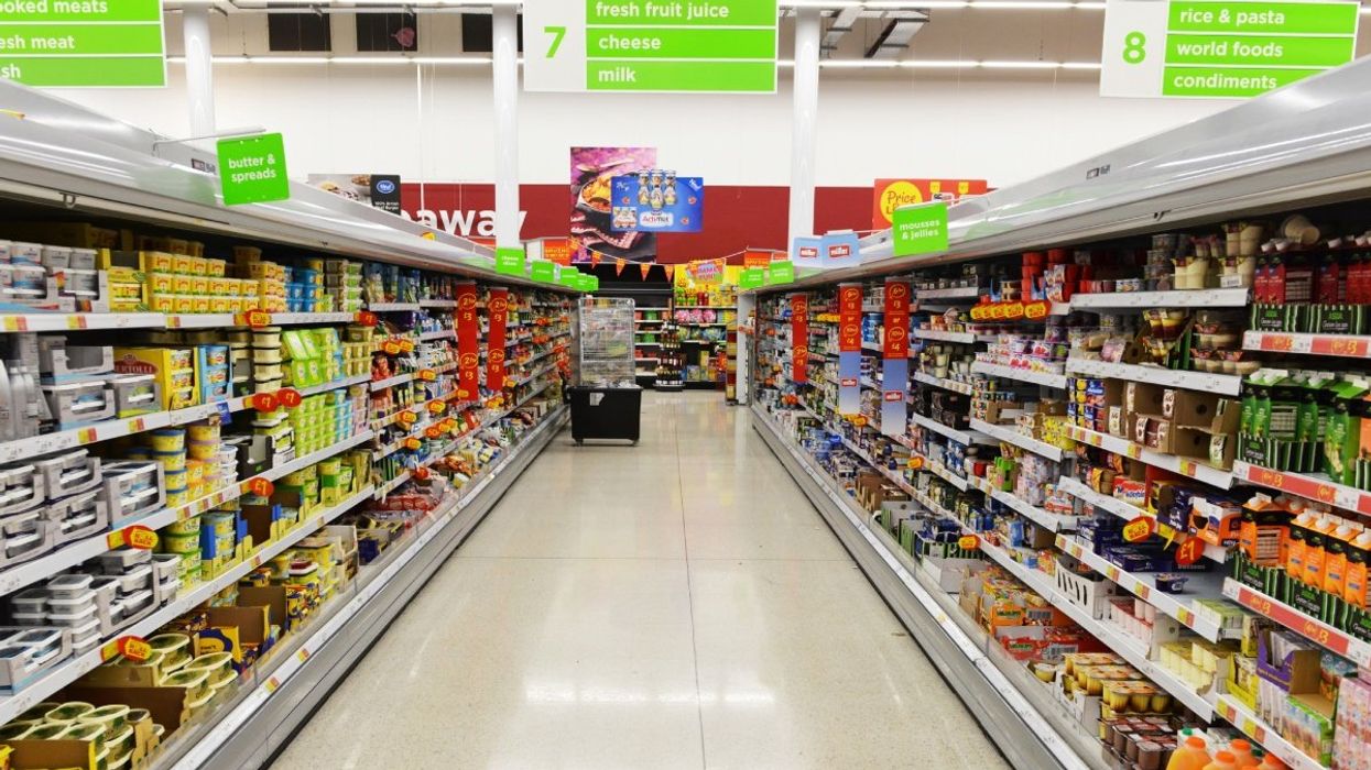 An empty grocery store aisle in Canada.