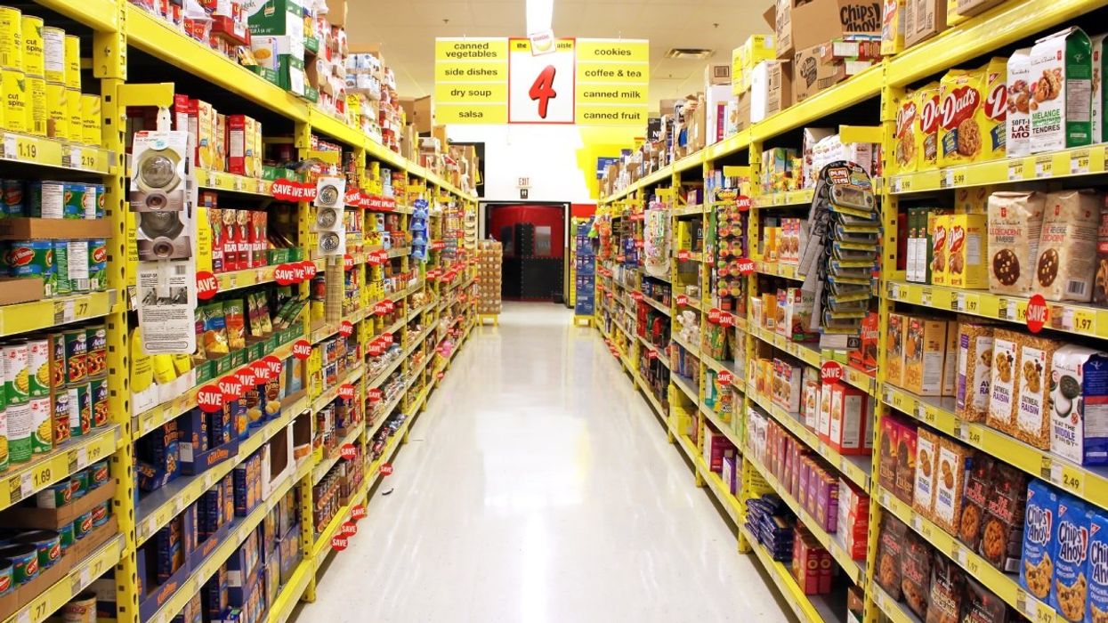 An empty grocery store aisle in Canada.