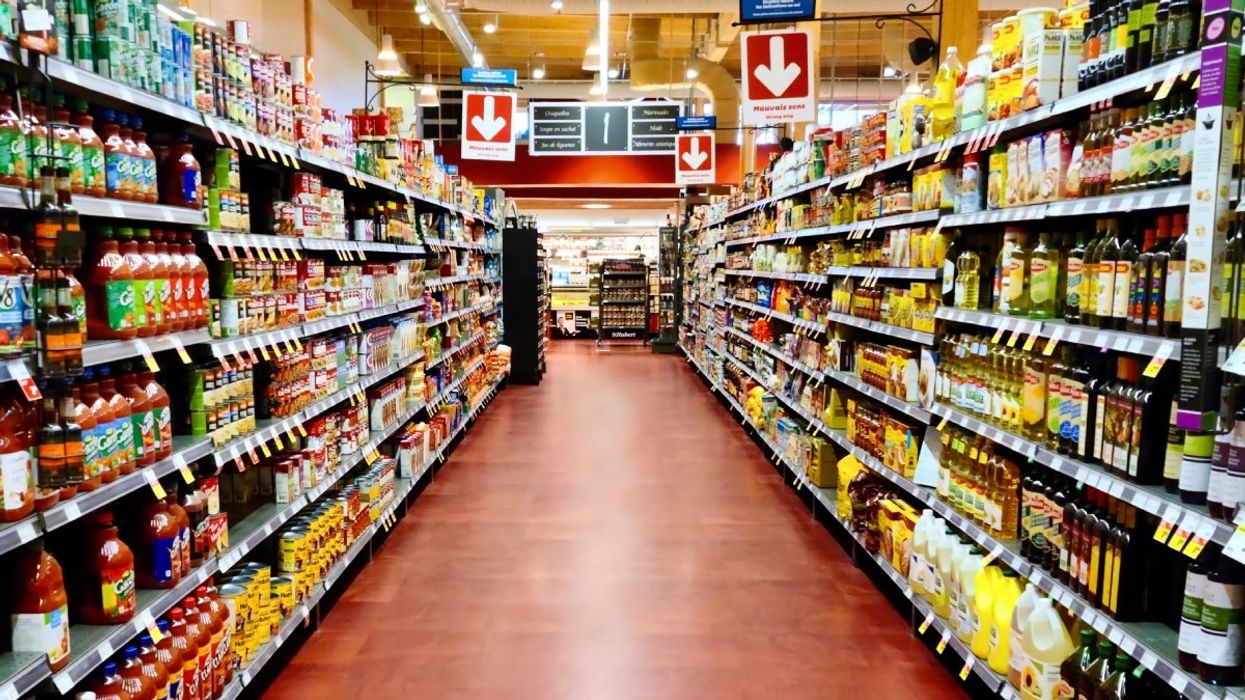 An empty grocery store aisle in Quebec, Canada.