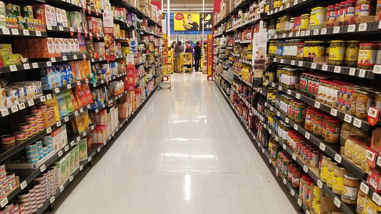 An empty grocery store aisle.
