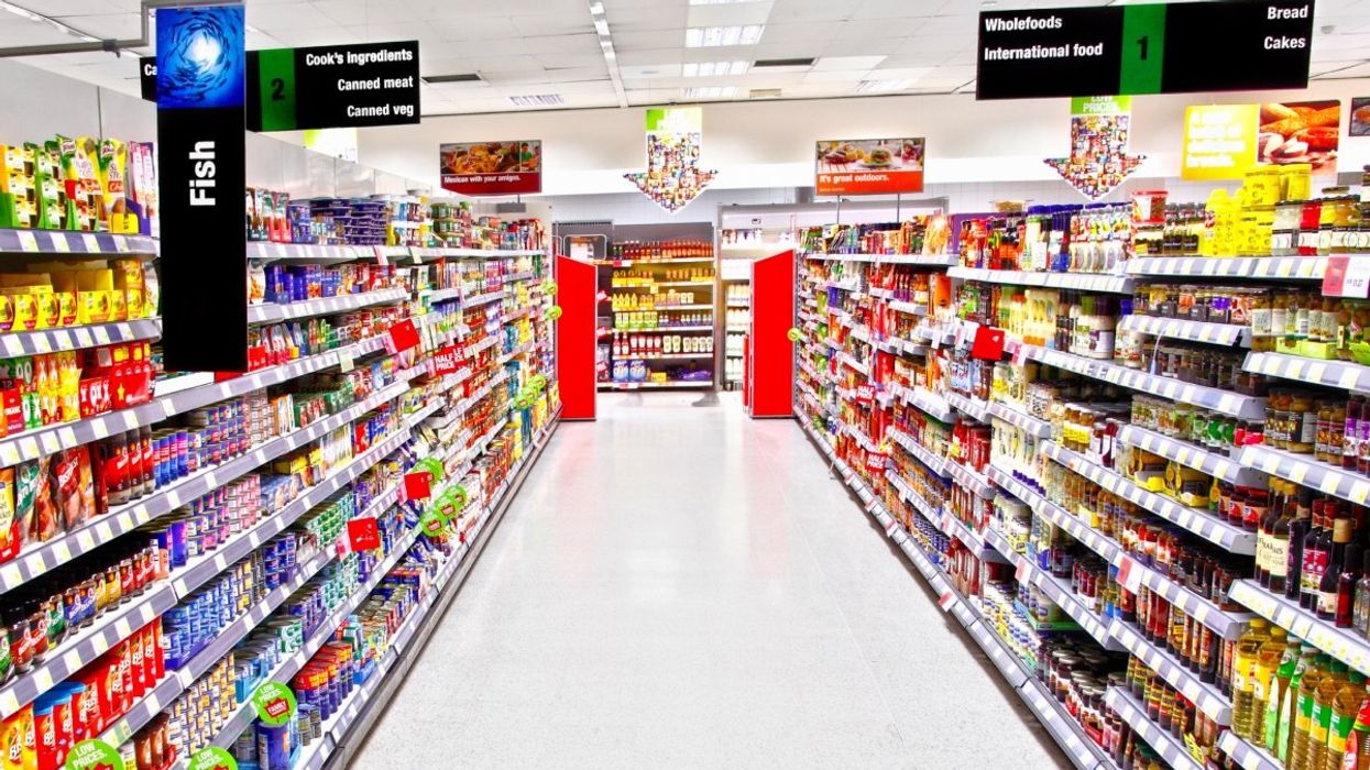 An empty grocery store aisle.